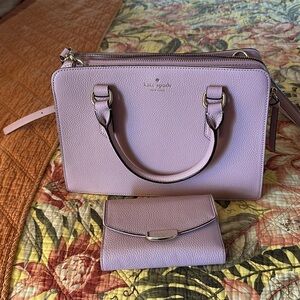 Kate Spade set of bag and wallet. It’s a pretty Mauve pink color in person